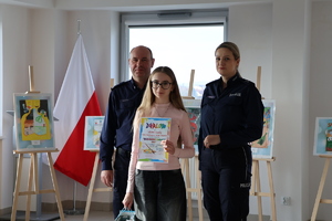 I Zastępca KPP w Jaśle oraz policjantka, wręczający laureatom nagrody