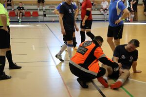 Zdjęcia z turnieju eliminacyjnego, na którym są zawodnicy i organizatorzy