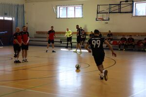 Zdjęcia z turnieju eliminacyjnego, na którym są zawodnicy i organizatorzy