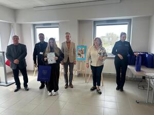Organizatorzy oraz laureaci podczas wręczania nagród